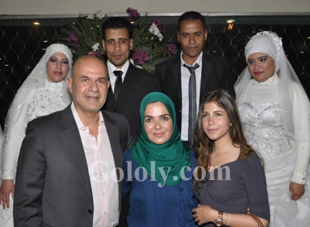 بالصور.. زفاف جماعي برعاية مني عبد الغني