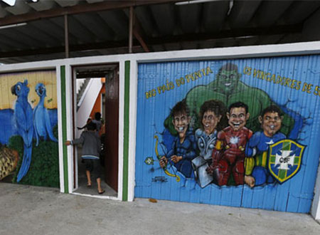 بالصور.. الجرافيتى يغزو شوارع البرازيل قبل انطلاق مونديال 2014