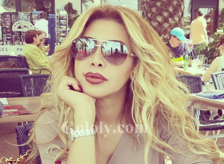 نون النسوة يشتعل بالأحمر على جسد نوال الزغبي.. صور