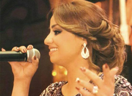 برواس حسين تدلي بصوتها في الانتخابات مع زوجها.. صور