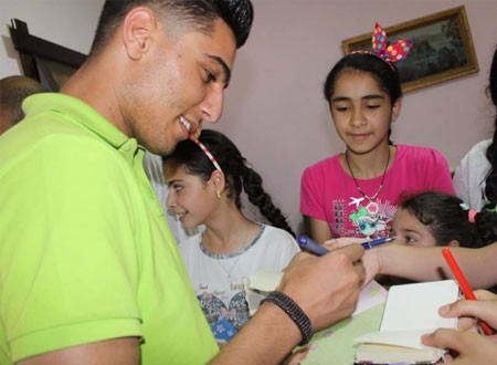 محمد عساف يتكفل بـ20 طفل يتيم.. صور