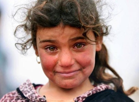موناليزا الموصل.. أجمل ابتسامة من قلب الأحزان 