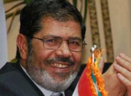 خبيرة تحلل جسد محمد مرسي