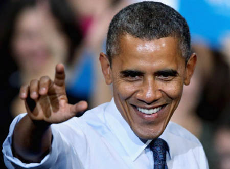 باراك أوباما يحضر مباراة كرة سلة لتشجيع شقيق زوجته.. صور
